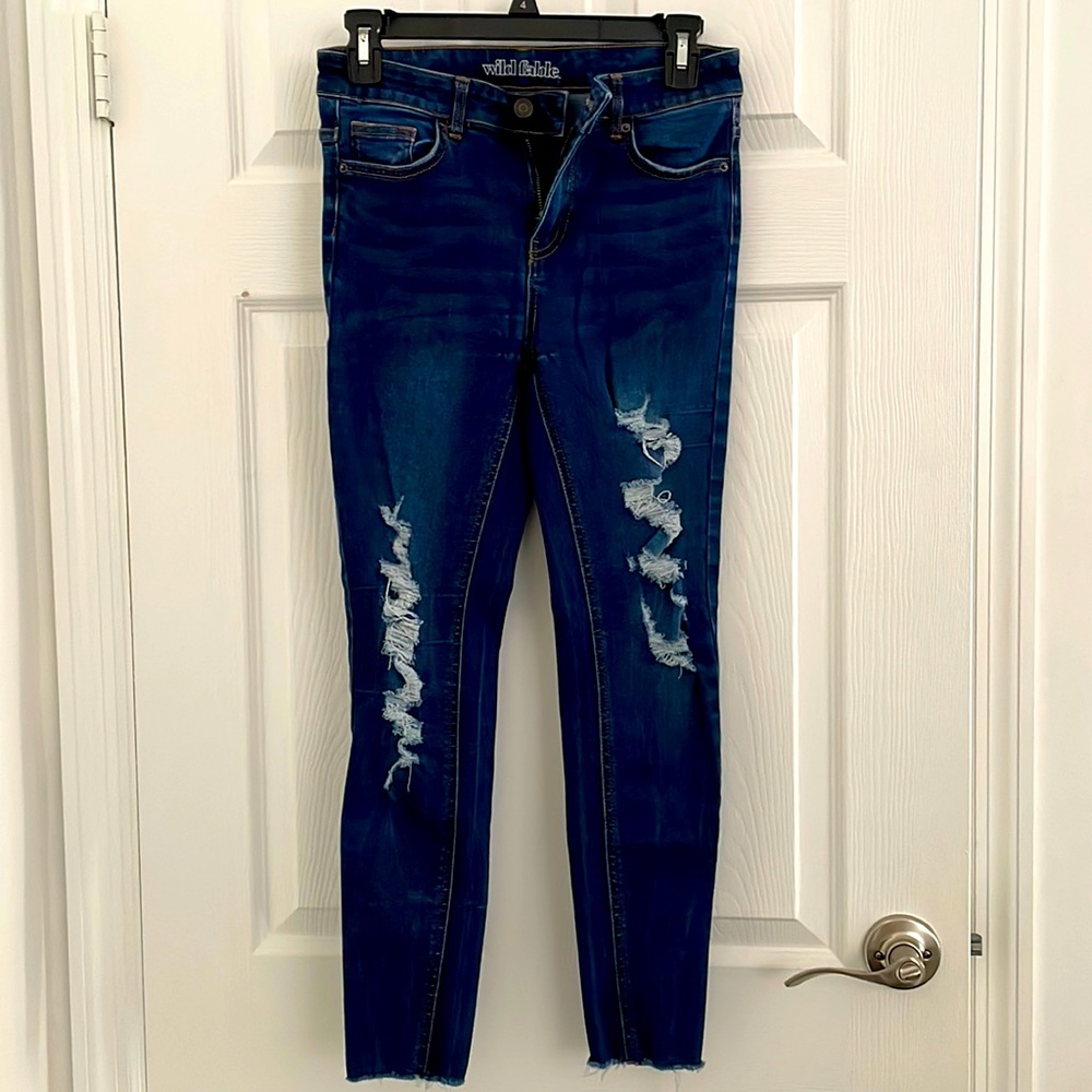 Dark blue stretchy ripped jeans size 4